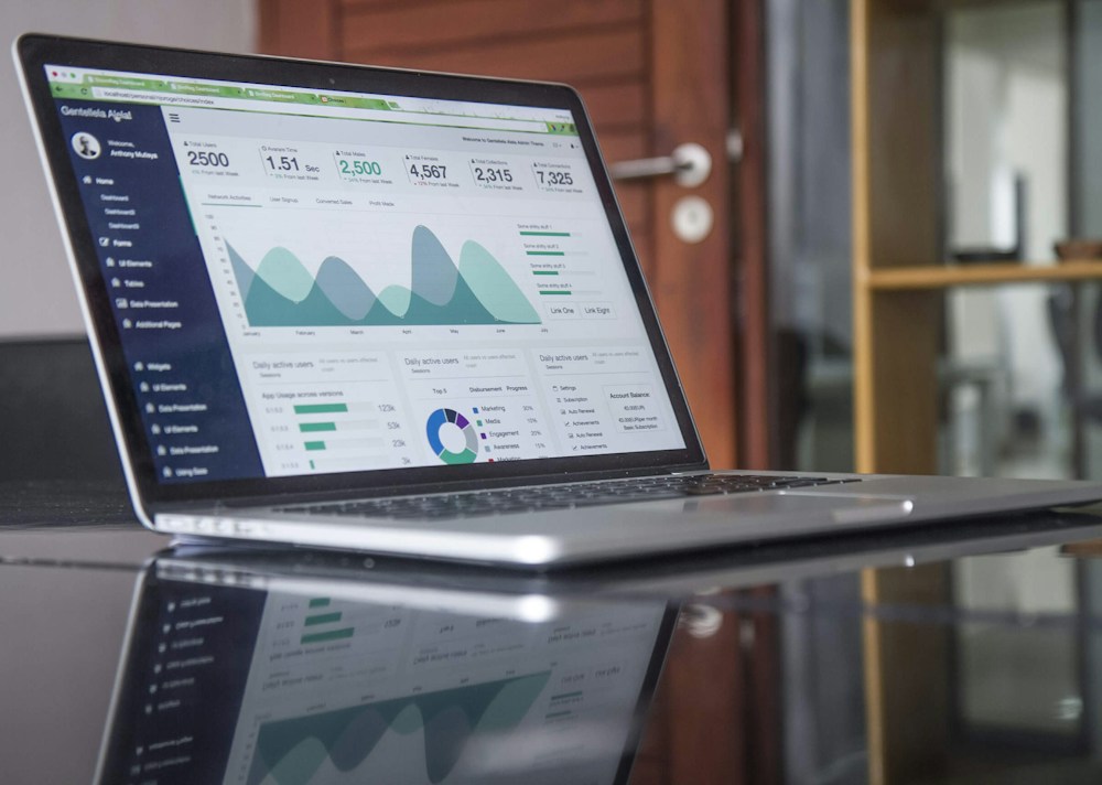 A laptop displaying content performance and analytics